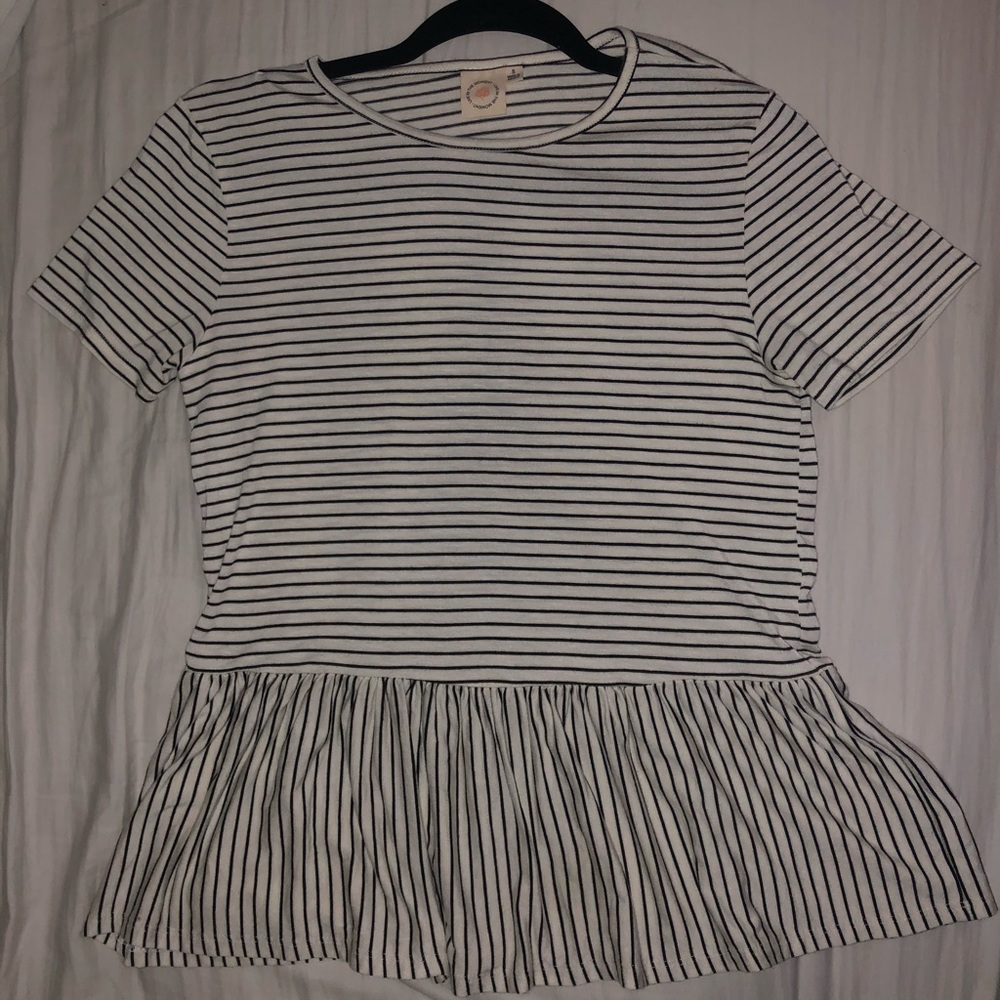 white top with black stripes
